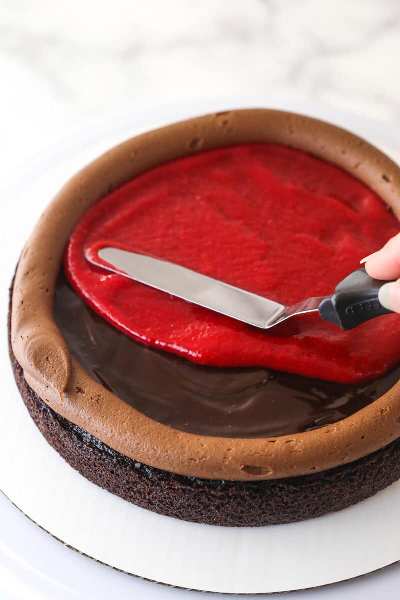 Layering Raspberry Chocolate Raspberry Layer Cake